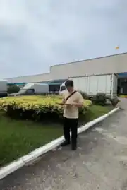 Tsai Ching-Fu reviewing space and operating movement at an overseas factory